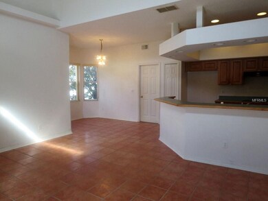 Family Room Looking into Dinette and Kitchen with 