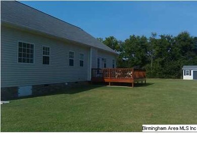 View of back with deck