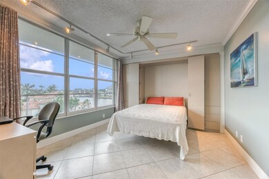 Second bedroom features a murphy bed, water views