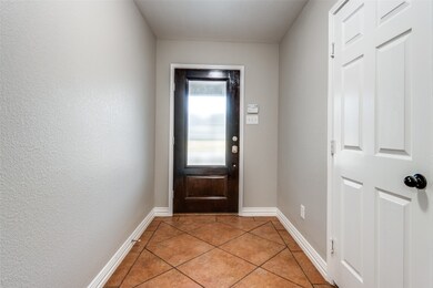 Exit of property and garage door next to it for your benefit.