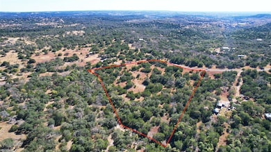 Aerial overview of property's location with property parcel outlined