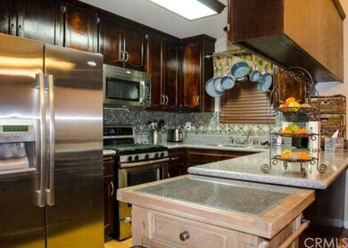 Kitchen with open view of family room