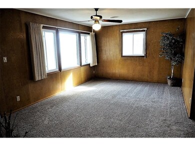 Living room with new carpeting.
