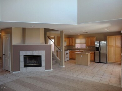2. LIVING ROOM WITH FIREPLACE OVER LOOKI