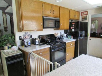 Kitchen with upgraged counters and appliances. Sel