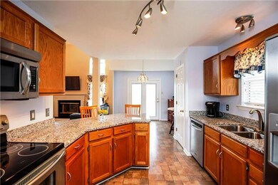 Stainless steel appliances and granite counters, Engineered wood floors