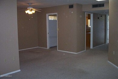 LOOKING FROM LIVING ROOM INTO/DINING/KIT