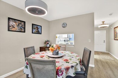 Dining room looking toward kitchen and front door