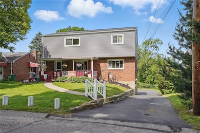 Level front yard and ample driveway