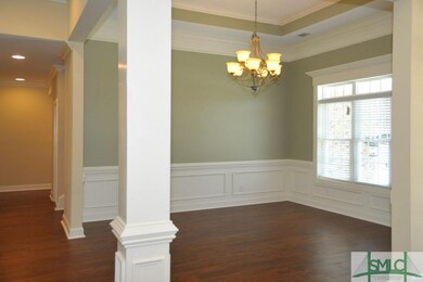 Fabulous dining room with tons of crown molding!