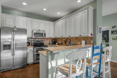Kitchen with appliances with stainless steel fini