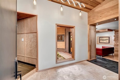 A proper entry, with hall tree, shoe storage, plenty of room to kick your shoes off.