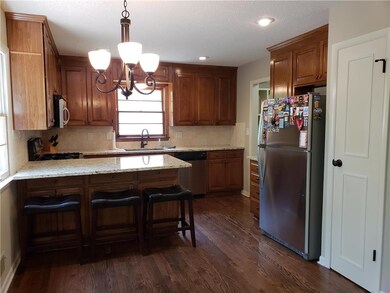 Dining space next to kitchen. 2nd pantry at door.