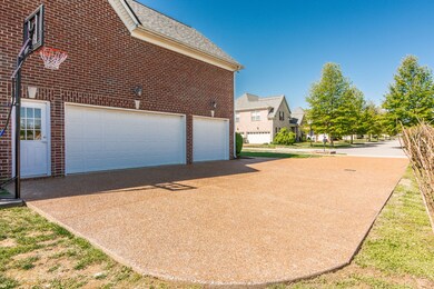 This is a true 3 car garage with extra space for storage too!