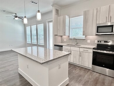 Kitchen with granite countertops, soft-close drawe