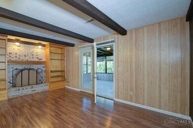 Family Room next to Kitchen / Walks out to  12 x 18  Screen Porch