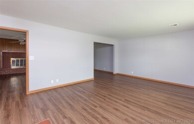 Two Nice Size Living Areas and Dining Room.