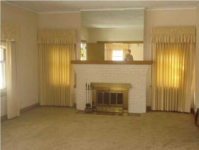 Living room with wood-burning fireplace (insert/bl