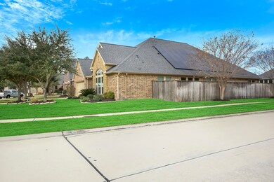 A view of the money saving solar panels. This Private Backyard is incredible with plenty of Green Space. Nice covered Patio that has been extended with a large green space. Gives this backyard plenty room to play outdoors or build your outdoor oasis.