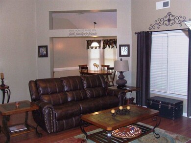 Great Room opens into Breakfast Room and Kitchen g