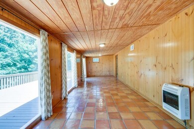 Access to the huge back deck with a view of the lake.
