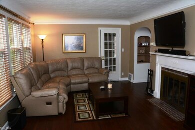 LARGE LIVING ROOM WITH GORGEOUS HARDWOOD FLOORS AN