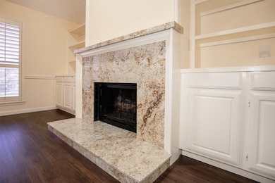 The fireplace serves as a striking focal point, fe