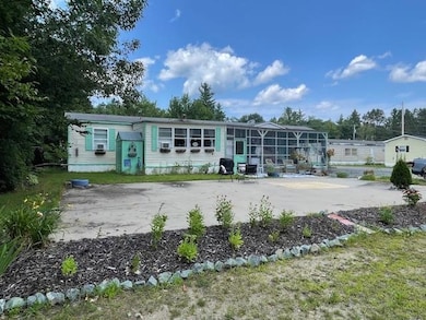 141 Lancaster Rd unit TRLR 9, Gorham, NH 03581 - photo 2