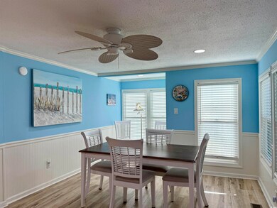 Dining space featuring light hardwood / wood-style