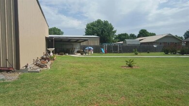 Covered patio area off of the shop.  Also has a ce