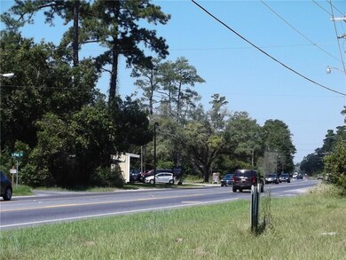 Street view Hwy 190 frontage traffic looking West