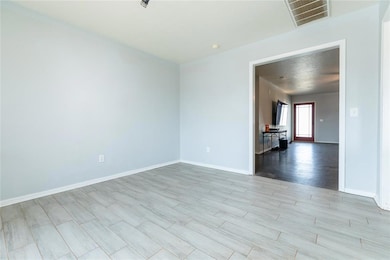 Dining Room with view into the Living Room