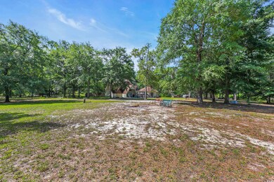 View of yard featuring view of scattered trees