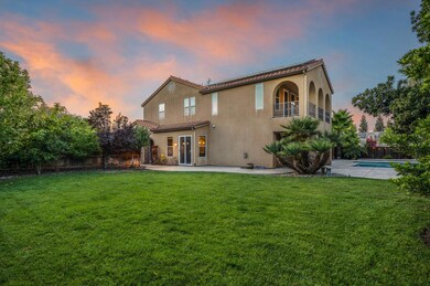 Huge grass area in back yard plus pool!
