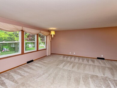 Spacious living area with newer windows, so much n