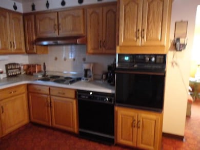 Kitchen Custom oak kitchen with built-in oven and 