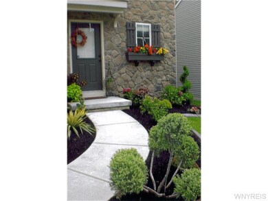 Exterior Front. Beautiful summer view of the entry