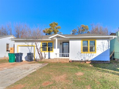Ranch-style house featuring a front lawn, covered 