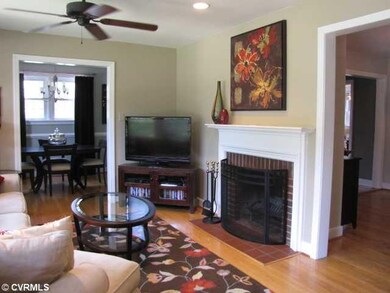 Living Room - Inviting Living room offers hardwood