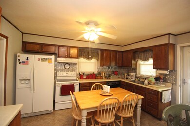 Another view of the kitchen. Range, dishwasher remain
