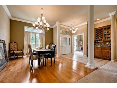 Dining Room. Entry into wet bar area & open formal dining area
