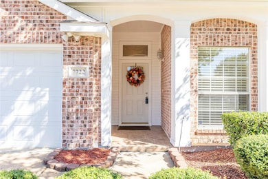 Property entrance with a garage