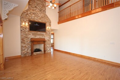 Family Room with Fireplace and french doors to bac