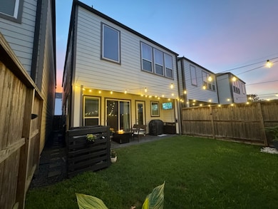 Amazing fully fenced backyard with covered patio,