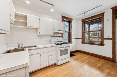 1447 W Roscoe St, Chicago, IL 60657 - photo 7