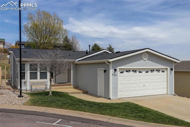 7668 Crested Jay Point, Colorado Springs, CO 80922 - photo 4