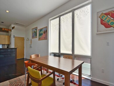 Dining area featuring dark wood finished floors, 