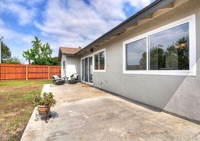 Large backyard with new redwood fencing and grass which will be grown in about a week