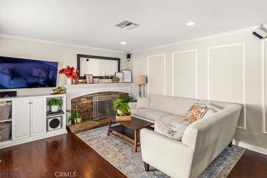 Wired Sound System, Stacked Stone Fireplace and Custom Crown and Wall Moulding