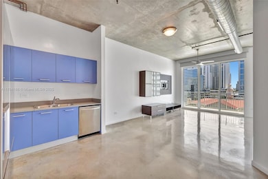 Loft style with high ceilings, polished concrete floors.